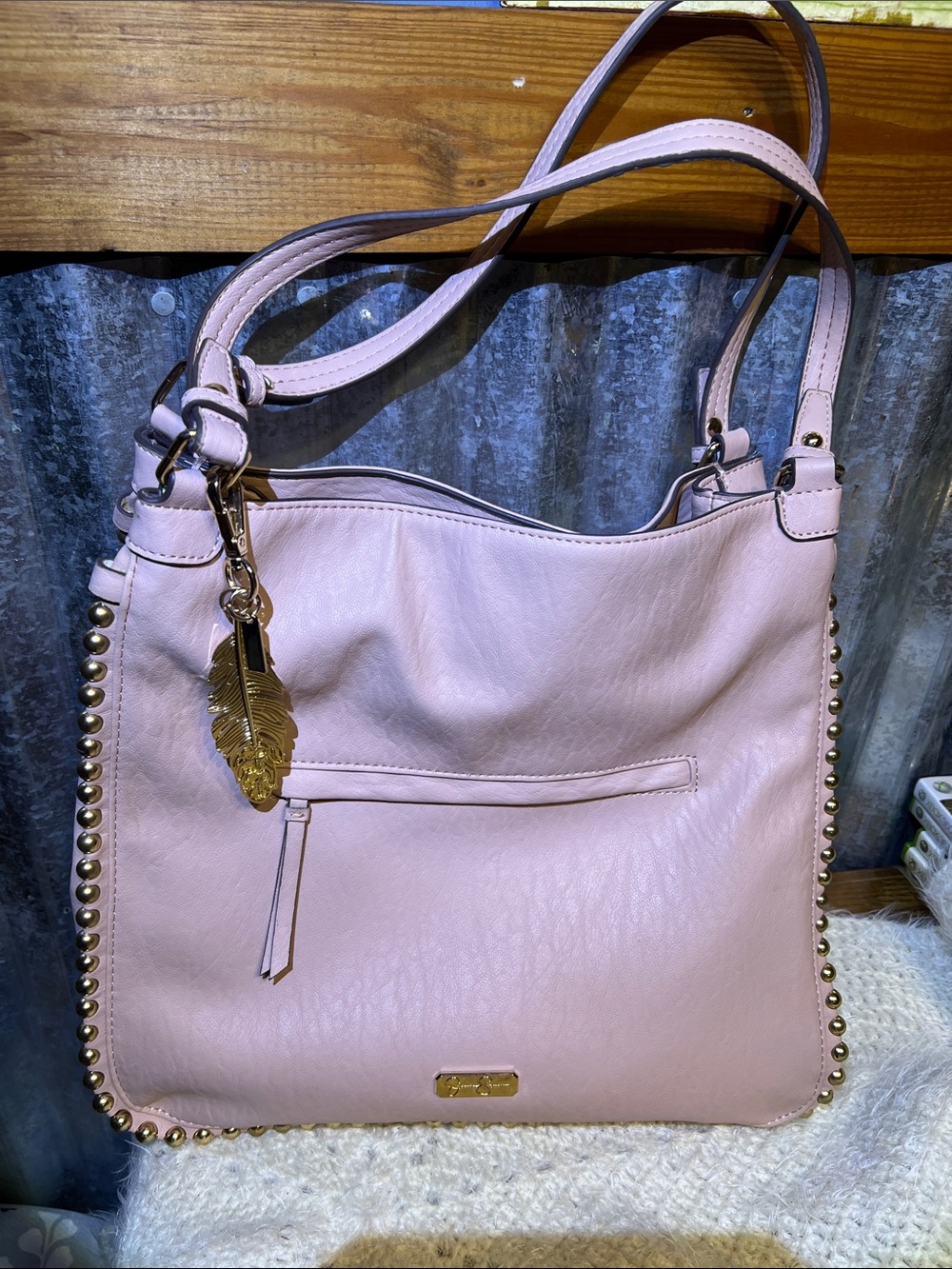 Jessica Simpson Pink Shoulder Bag with Gold tone Stud & Feather Charm